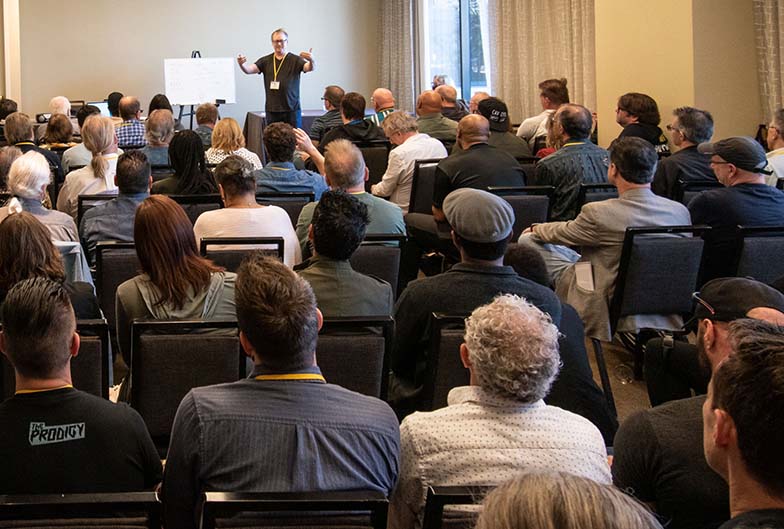 Composer Peter Neff teaches a breakout class on Composing Instrumental Cues for Production Music Libraries. Looks like he had a full house!