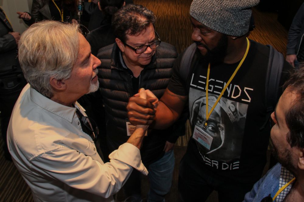 Rich Goldman (Founder, Riptide Music Group) spends some time with TAXI members Sergio Naranjo and Robert Tillis after wrapping up the Music Library panel he had just finished in the Grand Ballroom.