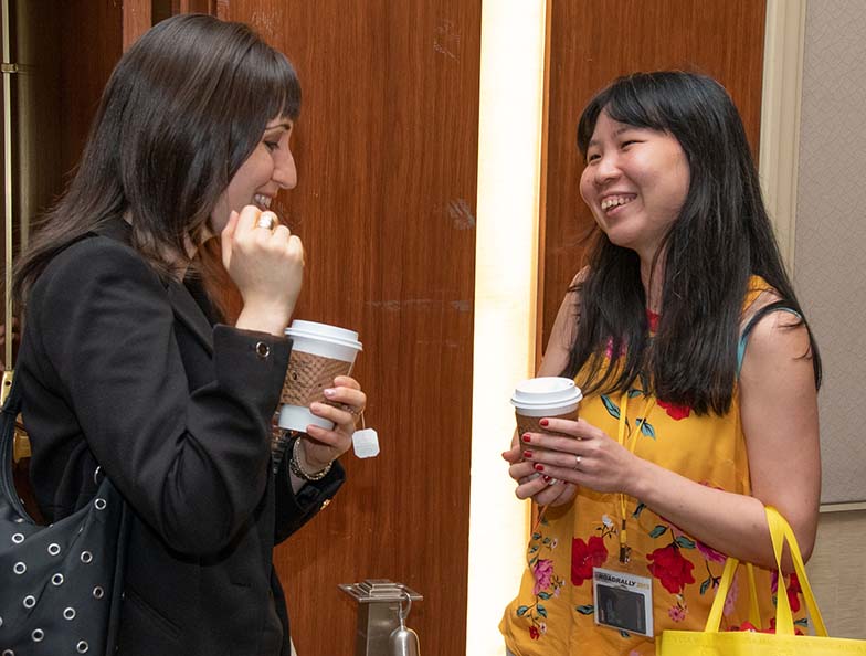 Music attorney Erin Jacobson takes a few minutes to give some advice to TAXI member Sherry-Lynn Lee after wrapping up a panel at the Road Rally.