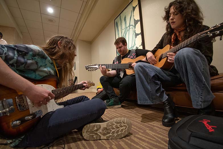 We don’t know who these TAXI members are, but they look like they’re having fun jamming in one of the hotel’s hallways! This was a common sight during the entire Road Rally.