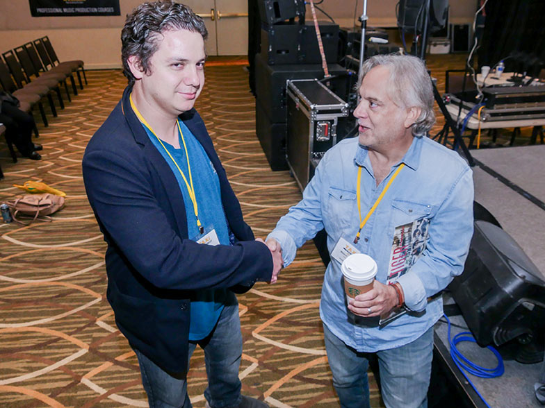 Music supervisor Mason Cooper meets a member after he finished his panel in the Grand Ballroom during TAXI’s 22nd Road Rally convention.