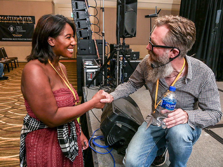 TAXI member Brit Fox had a nice chat with music supervisor Karl Richter after one of his panels in the Grand Ballroom.