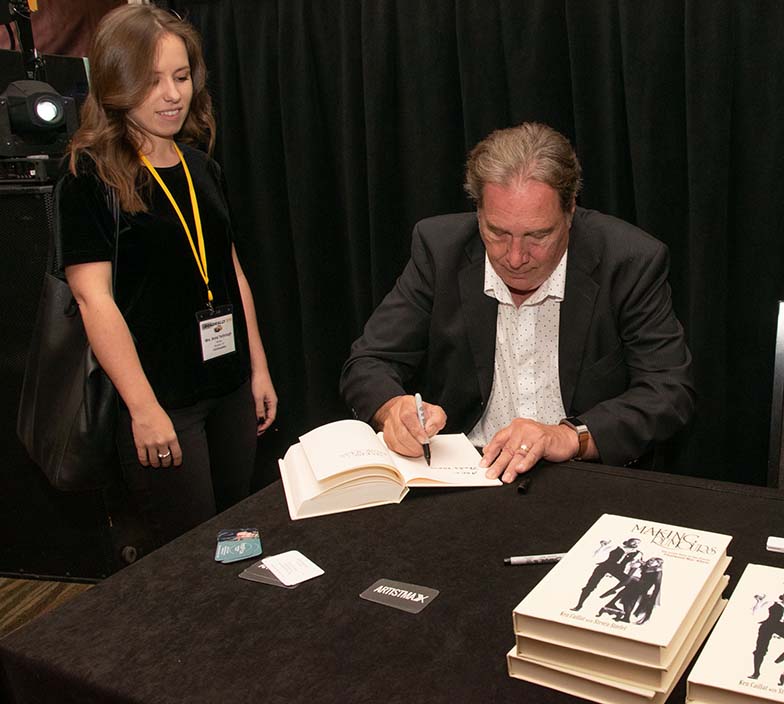 Ken Caillat signs a copy of his incredibly good book, Making Rumours for TAXI Member Anna Yarbrough.