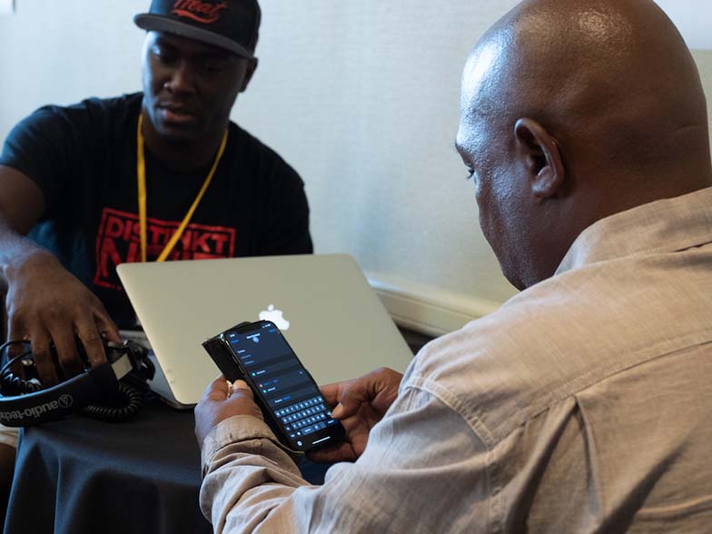 A&R person/producer Ty Knox gives some advice to a TAXI member during one of the One-to-One Mentor Sessions.