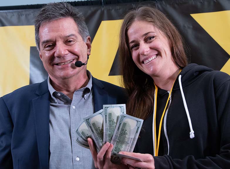 You’d think we would know the name of the person who won $500 in cash at the beginning of the Road Rally, but we can’t see her badge. Believe it or not, we haven’t yet memorized every member’s name ;-) Congrats lady who is smiling!!