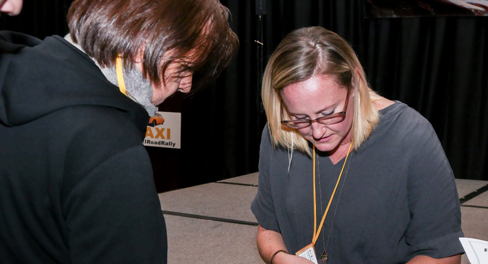 Shannon Quisenberry seems to be giving her email address to a member at after finishing her panel. The Road Rally is well-known as a place where tons of industry networking takes place every year.