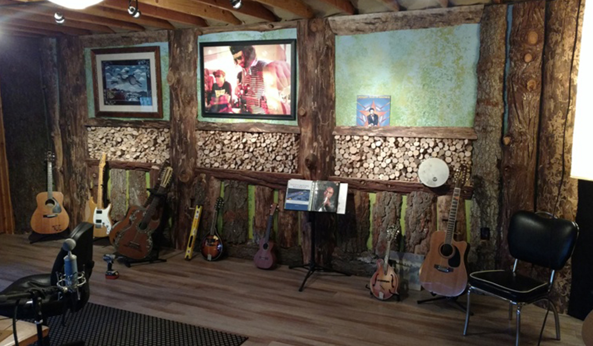 Some of Cass’s favorite acoustic instruments lined up against the studio’s back wall.